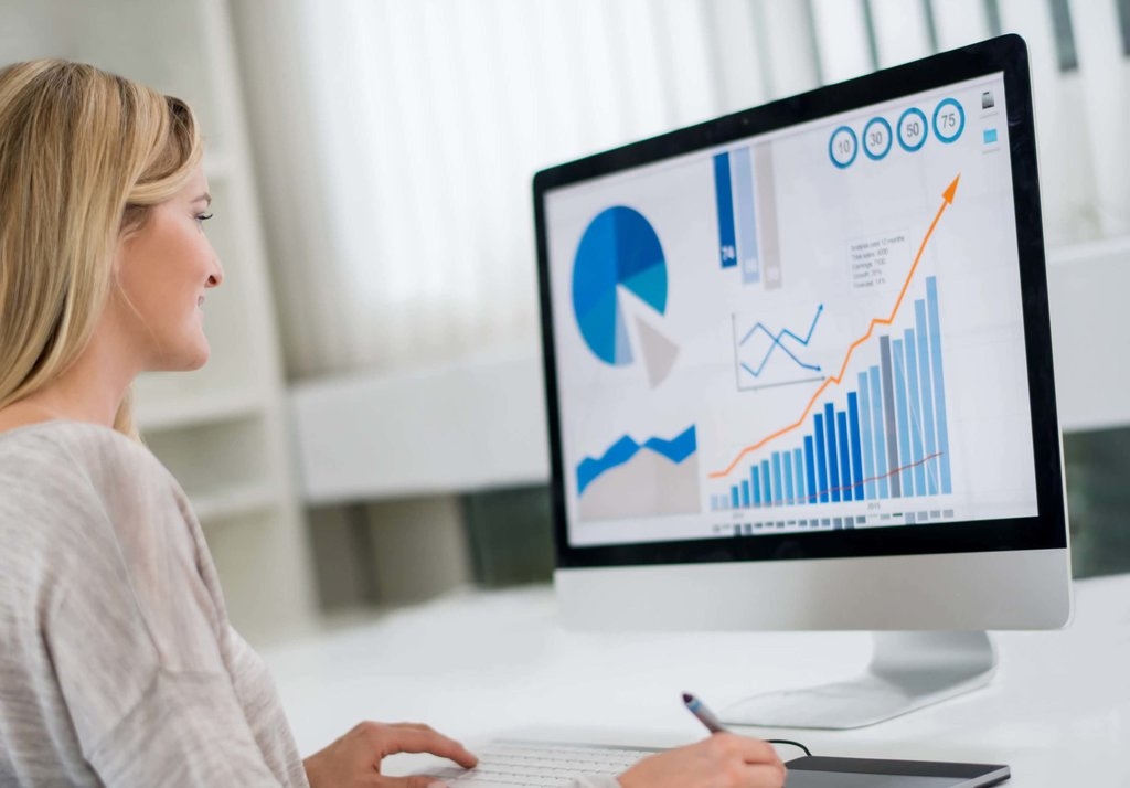 Woman Looking at analytics and Reports